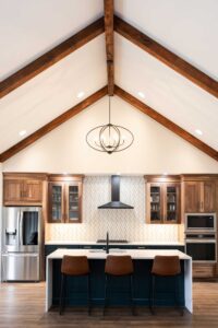 ranch kitchen island with view of vaulted ceiling